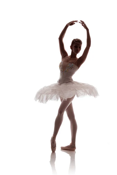 woman ballerina in white pack posing on white background, photo made in the style of \