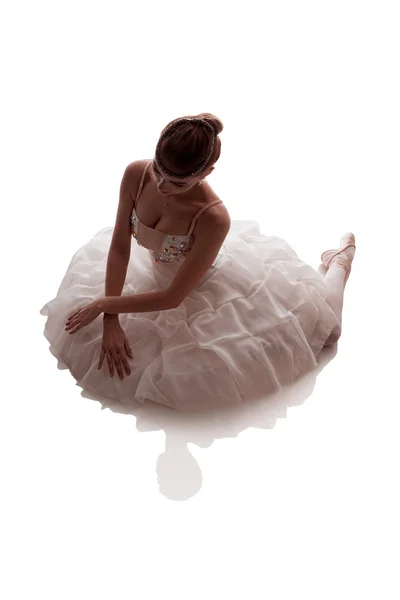 woman ballerina in white pack posing on white background, photo made in the style of \