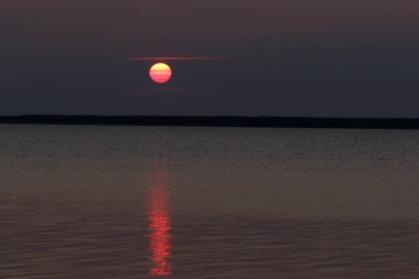 Prince Edward Island Sahil görüntülendi günbatımı.