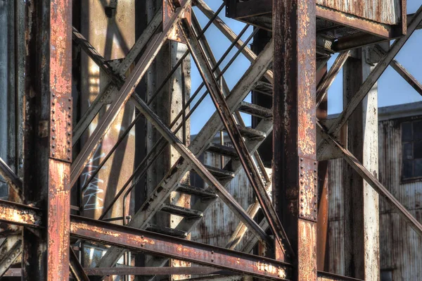 Abandoned rusted industrial structures in old port Stock Image
