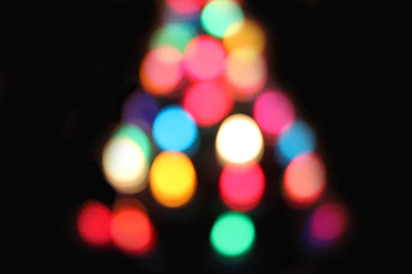 Weihnachtsbokeh aus Lichtern im Weihnachtsbaum — Stockfoto