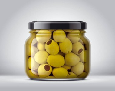 Arka planda zeytinli cam kavanoz. 