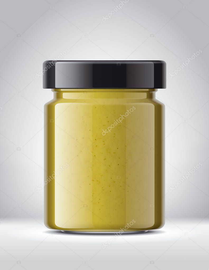 Glass Jar with Mustard on Background. 