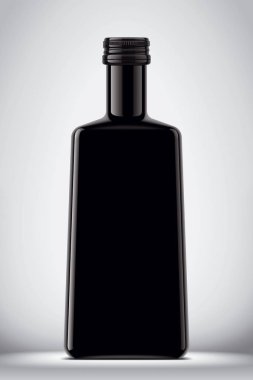 Gri arka planda cam siyah şişe