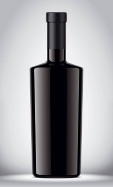 Gri arka planda cam siyah şişe