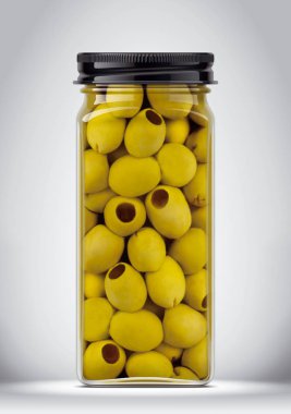 Arka planda zeytinli cam kavanoz. 