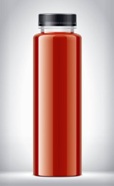 Arkaplanda domates suyu ile plastik şişe. 