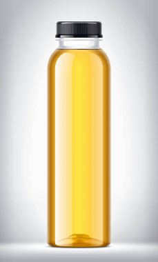 Arka planda elma suyu olan plastik şişe.. 