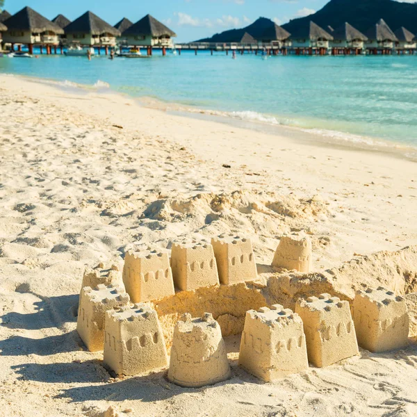 Sand castles on beach — Stock Photo, Image