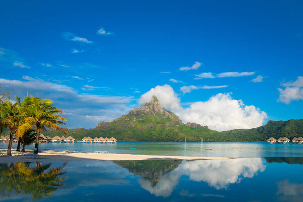 Bora Bora beach with reflection in turquoise water, Tahiti, French Polynesia