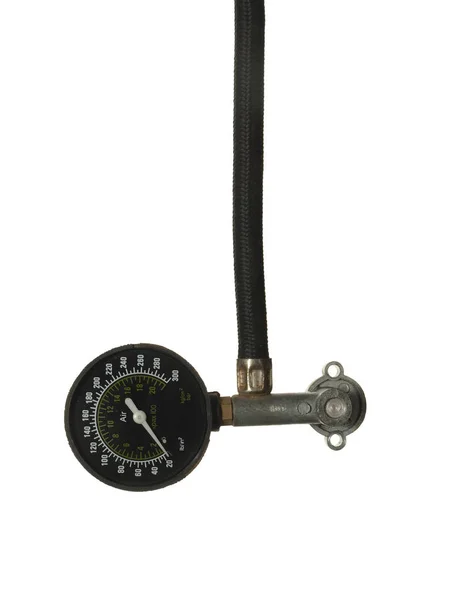 Pressure gauge with white arrow and black hose isolated on white — Stock Photo, Image