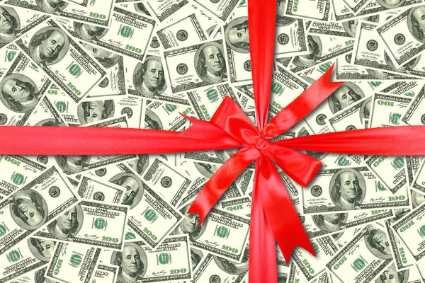 Kunterbunten Hintergrund Aus Chaotisch Verstreuten Dollarnoten Geschenk Gebunden Rote Schleife — Stockfoto