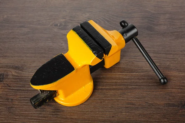 Metalwork Tool Yellow Black Vise Wooden Table Background — Stock Photo, Image