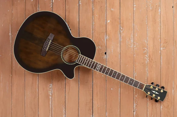 Instrument Muzyczny Widok Góry Elektryczna Gitara Akustyczna Cutaway Brązowy Tle — Zdjęcie stockowe