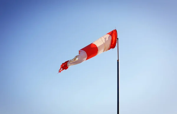 Boats parking and aircraft - Wind direction indicator. East — Stock Photo, Image