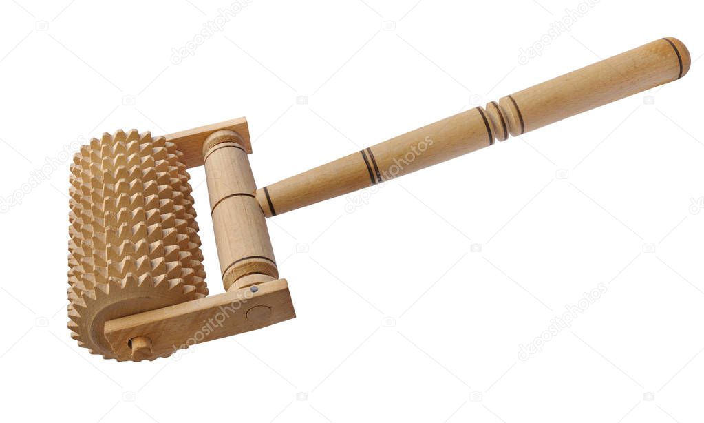 Gear massage roller made of wood on a white background