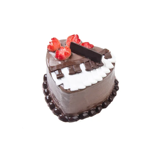 Kaka eller kärlek formad kaka på en bakgrund. — Stockfoto