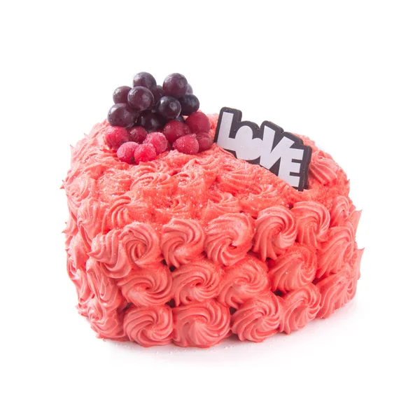 Gâteau ou gâteau en forme d'amour sur un fond . — Photo