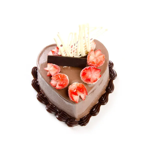 Bolo ou bolo em forma de amor em um fundo . — Fotografia de Stock