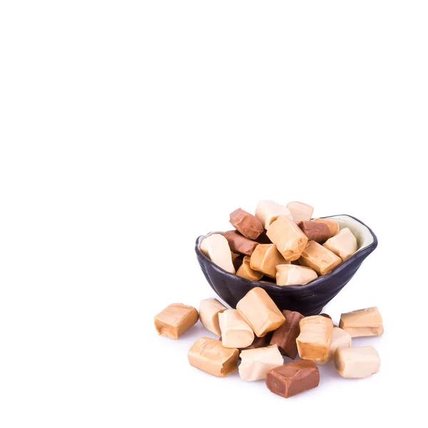 Caramelos o caramelos sobre un fondo blanco . — Foto de Stock