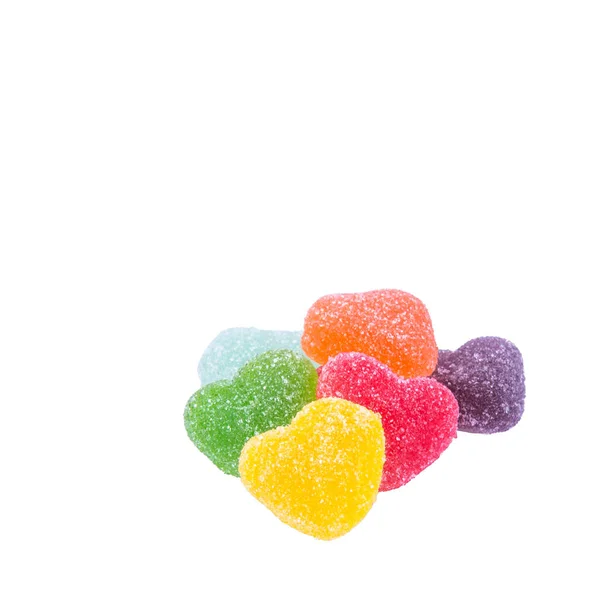 Caramelle o caramelle gelatina su uno sfondo bianco nuovo . — Foto Stock