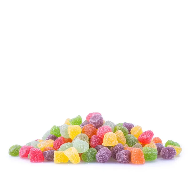 Caramelos o caramelos de gelatina sobre un fondo blanco nuevo . — Foto de Stock