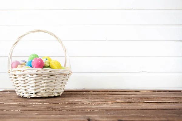 Easter eggs in the basket. Easter holiday concept. Copy space.