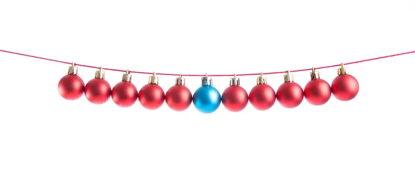 Line of red christmas balls on white background. Christmas decorations — Stock Photo, Image