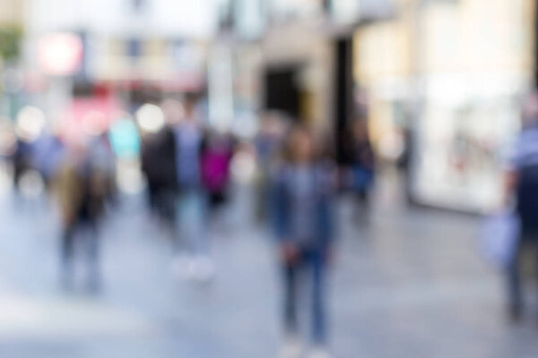 Defocused blur of people walking in the centre of Glasgow, Sauchiehall street, Scotland, UK