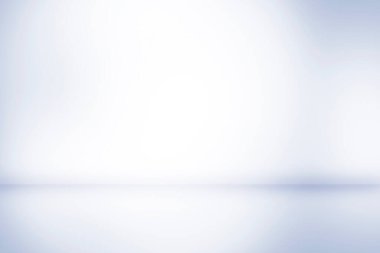 Stüdyo boş oda gradyan duvarı ve zemin iç arkaplanı ürün dağılımı için spot ışığı ile gösteriliyor