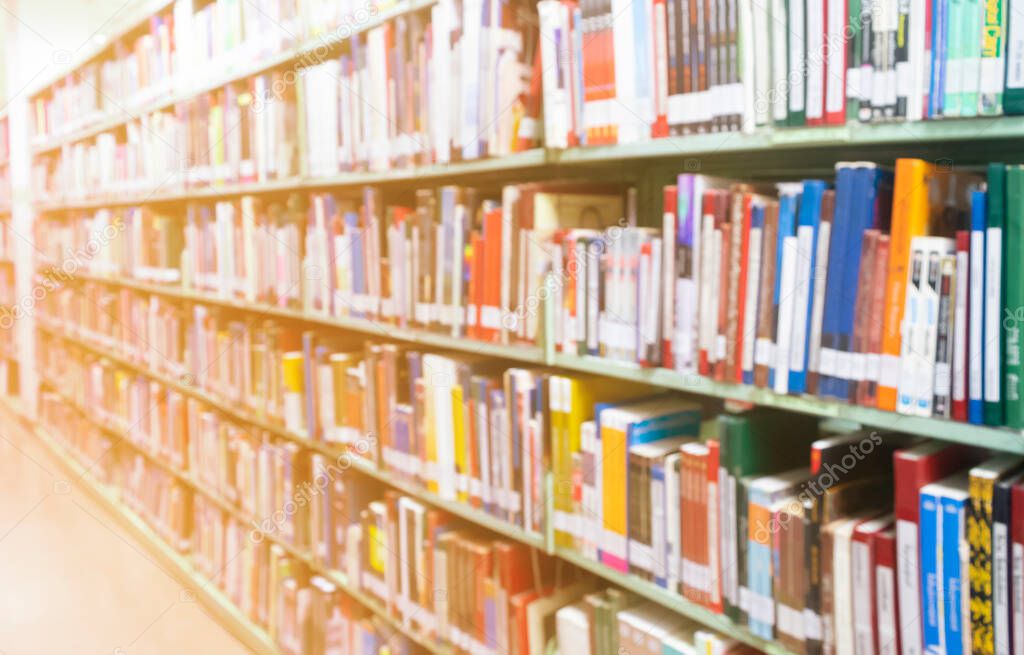 Many books on bookshelf in library room blurred background for reading ,education and knowledge in university or schoo