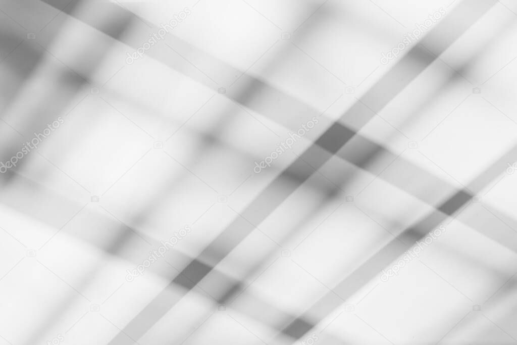 Abstract architecture shadow and light in office room background on white wall from window, shadows indoor in house black and white backgroun