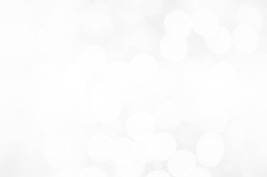 Beyaz bokeh ışık arka planı. Noel kış bayramı kutlaması için soyut, bulanık, parlak daire ışığı, mutlu yeni yıl arkaplanı ve tasarımı, odağının dağının dağılması.