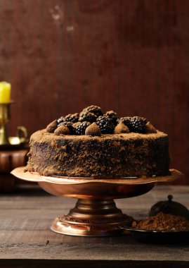 super chocolate truffle cake with black raspberries clipart