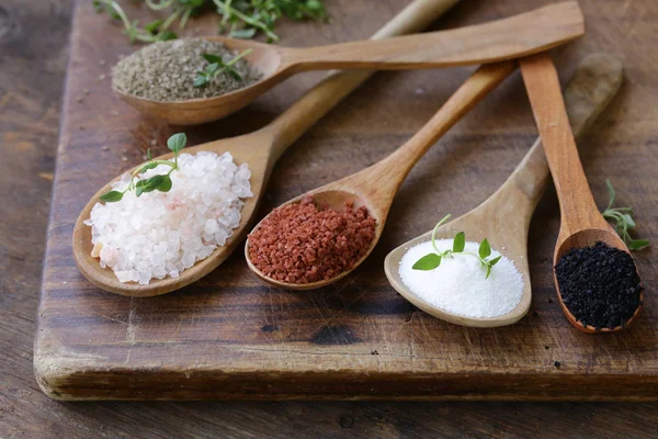 Different Varieties Salt Wooden Spoons — Stock Photo, Image