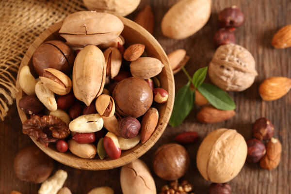 organic mix nuts on a wooden table