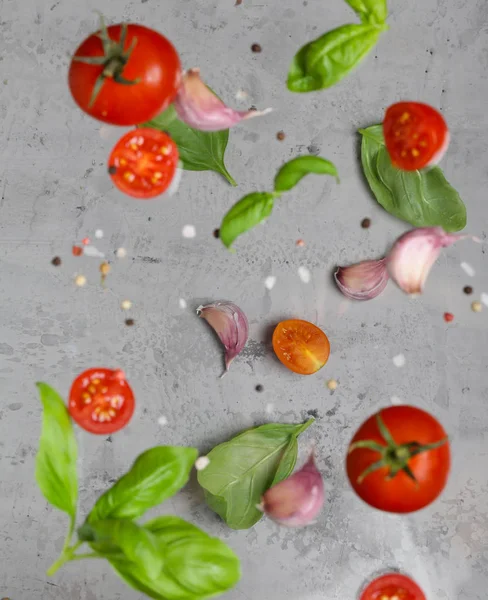 flying vegetables and herbs for salad