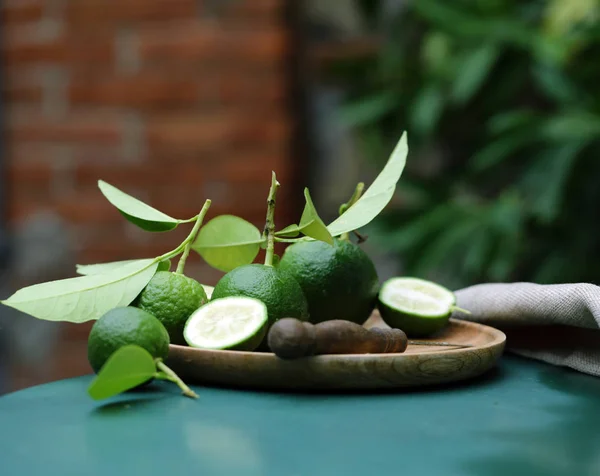 natural organic lime with green leaves