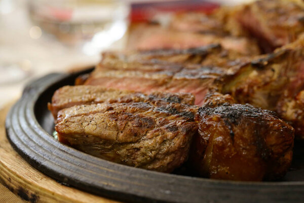 Large Florentine steak fried meat in a pan