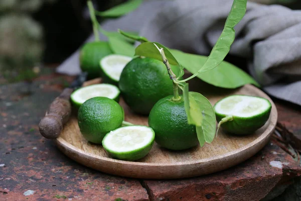 natural organic lime with green leaves