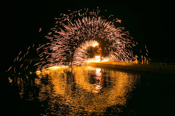 Fire show amazing at night in wedding party.
