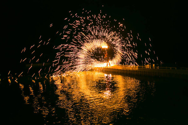 Fire show amazing at night in wedding party.