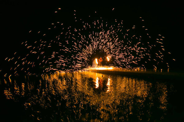 Fire show amazing at night in wedding party.