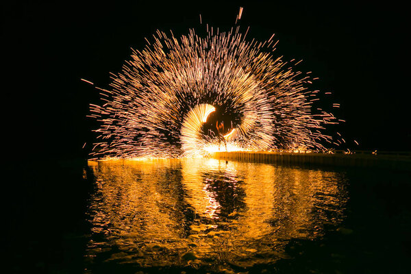 Fire show amazing at night in wedding party.