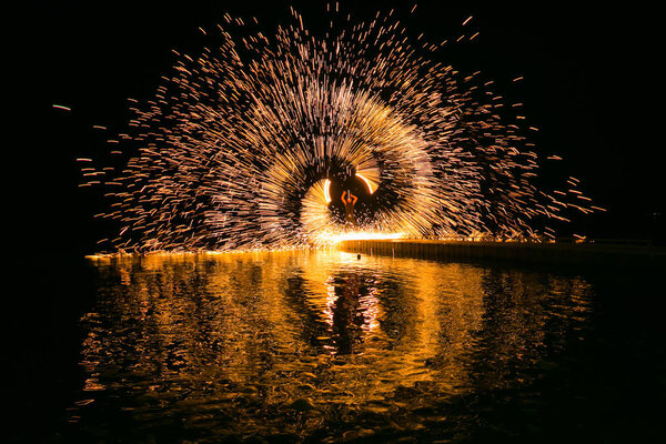 Fire show amazing at night in wedding party.
