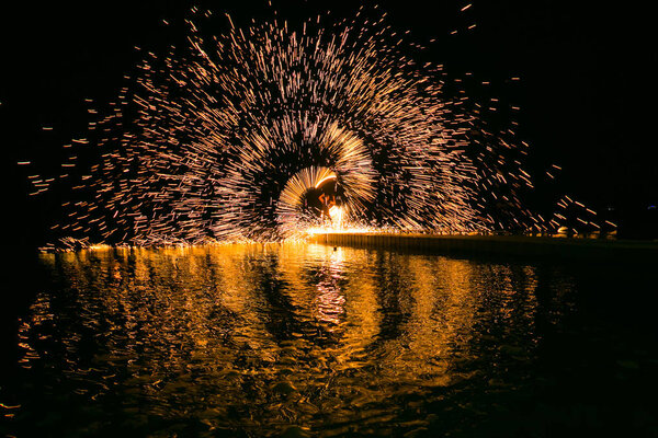Fire show amazing at night in wedding party.
