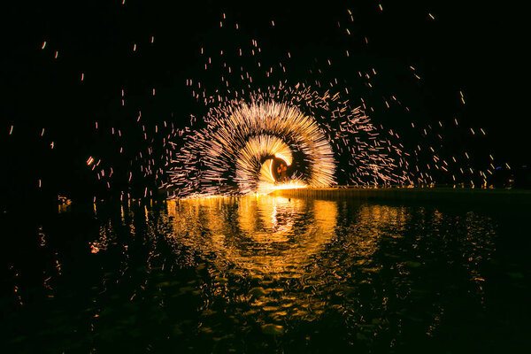 Fire show amazing at night in wedding party.