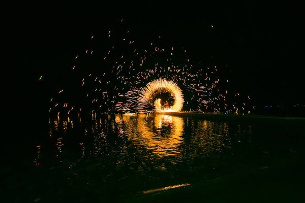 Fire show amazing at night in wedding party.