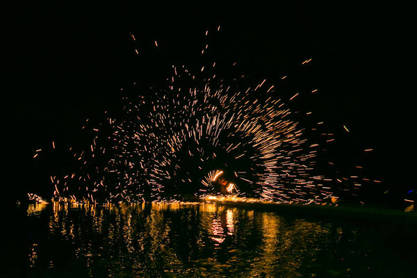 Fire show amazing at night in wedding party.