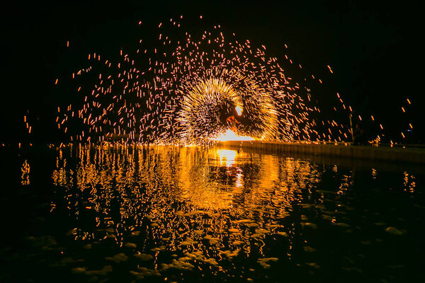 Fire show amazing at night in wedding party.